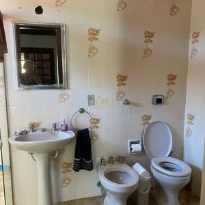 Casa com 247m², 5 dormitórios, 3 suítes, 3 vagas no bairro Praia Grande em Torres para Comprar