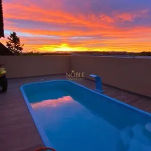 Casa com 108m², 2 dormitórios, 2 vagas no bairro Capão do Cravo em Passo de Torres para Comprar