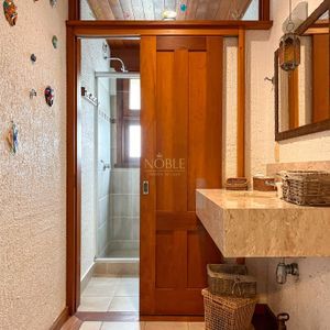 Casa, 4 dormitórios, 2 suítes, 3 vagas no bairro Praia Grande em Torres para Comprar