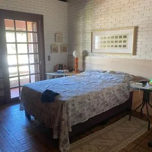 Casa com 247m², 5 dormitórios, 3 suítes, 3 vagas no bairro Praia Grande em Torres para Comprar