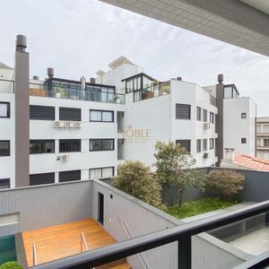 Apartamento com 83m², 2 dormitórios, 1 suíte, 2 vagas no Residencial Exclusive em Torres para Comprar