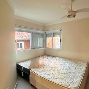 Apartamento com 113m², 3 dormitórios, 1 suíte, 2 vagas no Riviere em Torres para Comprar