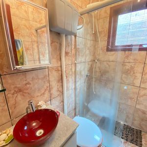 Casa com 300m², 5 dormitórios, 3 vagas no bairro Getúlio Vargas em Torres para Comprar