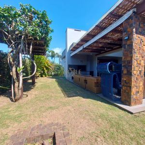 Casa com 210m², 3 dormitórios, 3 suítes, 2 vagas no Ocean Side em Torres para Comprar