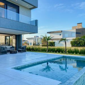 Casa de Condomínio com 375m², 4 dormitórios, 4 suítes, 2 vagas no Condomínio Ilhas Park em Torres para Comprar