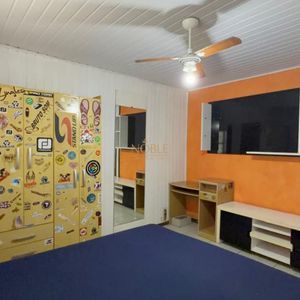 Casa com 130m², 2 dormitórios, 2 vagas no bairro Praia da Cal em Torres para Comprar