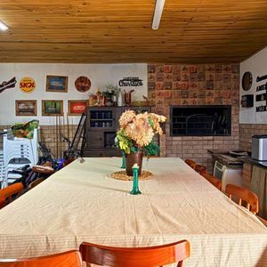 Casa com 240m², 4 dormitórios, 1 suíte, 3 vagas no bairro Praia da Cal em Torres para Comprar