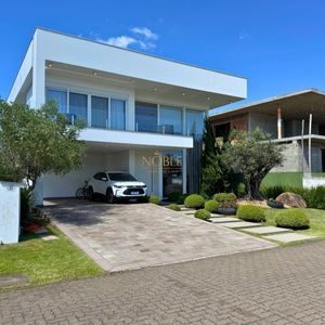 Casa de Condomínio com 444m², 4 dormitórios, 4 suítes, 4 vagas no Reserva das Águas em Torres para Comprar