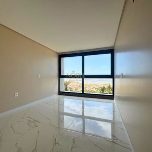 Casa com 272m², 3 dormitórios, 3 suítes, 4 vagas no bairro Itapeva em Torres para Comprar