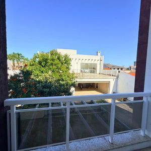 Casa com 400m², 5 dormitórios, 1 suíte, 4 vagas no bairro Stan em Torres para Comprar