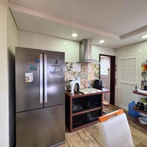 Casa com 180m², 3 dormitórios, 2 suítes, 2 vagas no bairro Caravelle em Passo de Torres para Comprar