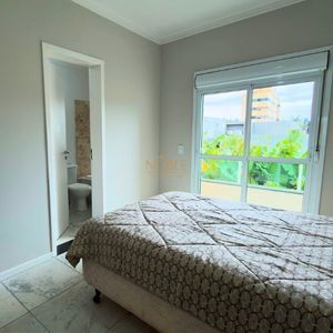 Sobrado com 127m², 3 dormitórios, 1 suíte, 1 vaga no Ilhas Travertino em Torres para Comprar