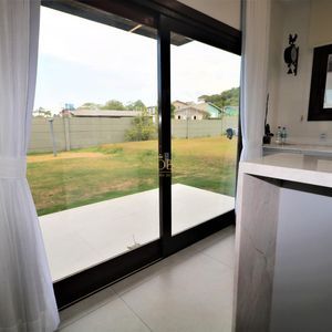 Casa de Condomínio com 301m², 4 dormitórios, 4 suítes, 2 vagas no Reserva das Águas em Torres para Comprar