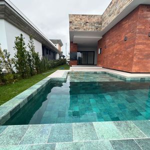 Casa de Condomínio com 220m², 3 dormitórios, 3 suítes, 2 vagas no Reserva das Águas em Torres para Comprar