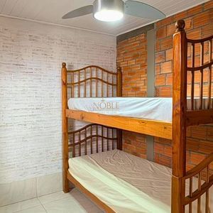 Casa com 98m², 3 dormitórios, 2 vagas no bairro Praia da Cal em Torres para Comprar