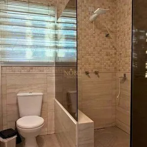 Casa com 243m², 4 dormitórios, 1 suíte, 2 vagas no bairro Stan em Torres para Comprar