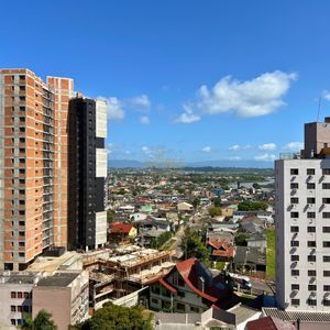 Apartamento com 92m², 2 dormitórios, 2 suítes, 2 vagas no Rosa dos Ventos em Torres para Comprar