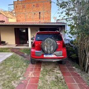 Casa, 3 dormitórios, 2 vagas no bairro Centro em Torres para Comprar