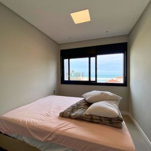 Apartamento com 99m², 3 dormitórios, 1 suíte, 2 vagas no Essenza em Torres para Comprar