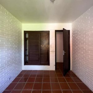 Casa com 100m², 2 dormitórios, 3 vagas no bairro Praia da Cal em Torres para Comprar