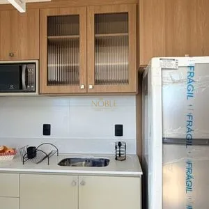Apartamento com 64m², 2 dormitórios, 1 suíte, 1 vaga no Aston em Torres para Comprar