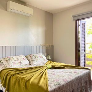 Casa com 518m², 5 dormitórios, 2 suítes, 2 vagas no bairro Praia Grande em Torres para Comprar