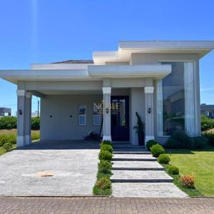 Casa de Condomínio com 226m², 3 dormitórios, 3 suítes, 2 vagas no Reserva das Águas em Torres para Comprar