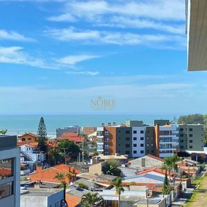 Apartamento com 67m², 2 dormitórios, 1 vaga no Majestic Residencial em Torres para Comprar