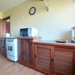 Apartamento com 104m², 2 dormitórios, 1 suíte, 1 vaga no Morada de Torres em Torres para Comprar