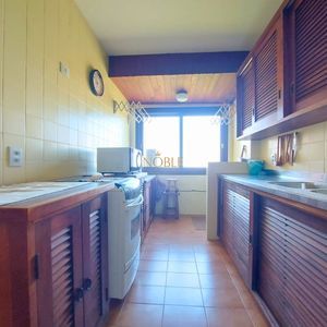 Apartamento com 104m², 2 dormitórios, 1 suíte, 1 vaga no Morada de Torres em Torres para Comprar