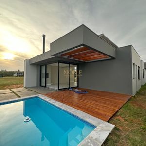 Casa de Condomínio com 228m², 3 dormitórios, 3 suítes, 2 vagas no Reserva das Águas em Torres para Comprar