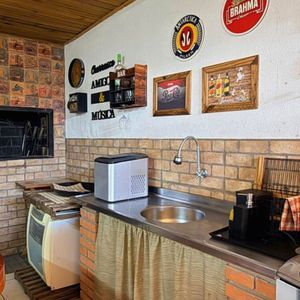 Casa com 240m², 4 dormitórios, 1 suíte, 3 vagas no bairro Praia da Cal em Torres para Comprar