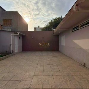 Casa com 171m², 4 dormitórios, 3 vagas no bairro Porto Alegre em Torres para Comprar