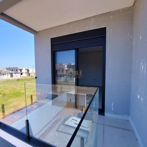 Geminado com 110m², 3 dormitórios, 1 suíte, 1 vaga no bairro Morada das Palmeiras em Torres para Comprar