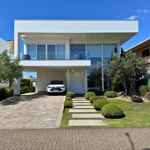 Casa de Condomínio com 444m², 4 dormitórios, 4 suítes, 4 vagas no Reserva das Águas em Torres para Comprar