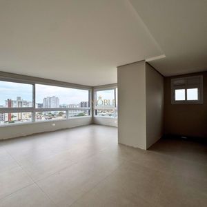 Apartamento com 72m², 2 dormitórios, 1 suíte, 1 vaga no Topazio em Torres para Comprar