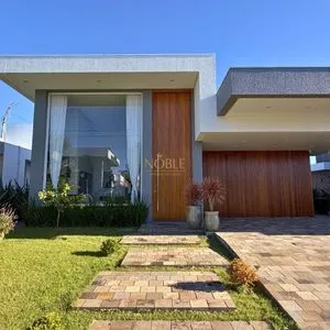 Casa de Condomínio com 206m², 4 dormitórios, 4 suítes, 2 vagas no Reserva das Águas em Torres para Comprar
