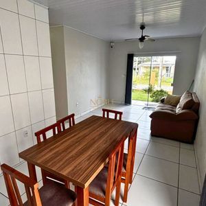 Casa com 125m², 3 dormitórios, 2 vagas no bairro Loteamento Caravelle em Passo de Torres para Comprar
