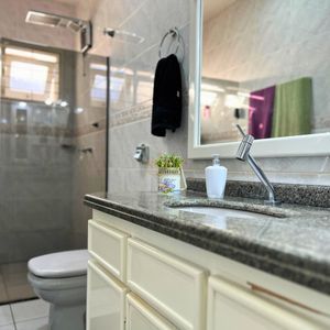 Casa com 184m², 3 dormitórios, 1 suíte, 2 vagas no bairro Igra Norte em Torres para Comprar