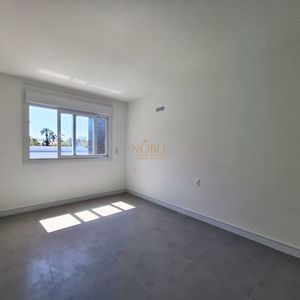 Apartamento com 74m², 2 dormitórios, 1 suíte, 1 vaga no Residencial Acrópole em Torres para Comprar