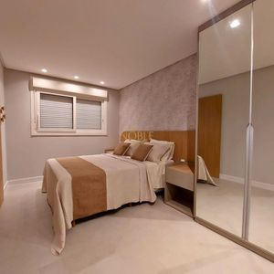 Apartamento com 108m², 3 dormitórios, 1 suíte, 2 vagas no Maui Residencial em Torres para Comprar