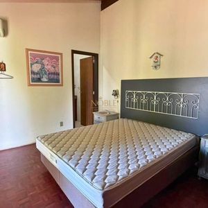 Sobrado com 199m², 3 dormitórios, 3 suítes, 2 vagas no bairro Praia da Cal em Torres para Comprar