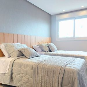 Apartamento com 102m², 3 dormitórios, 1 suíte, 2 vagas no Maui Residencial em Torres para Comprar