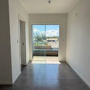 Sobrado com 148m², 3 dormitórios, 1 suíte, 2 vagas no bairro Tapera em Passo de Torres para Comprar