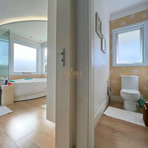 Casa com 600m², 4 dormitórios, 1 suíte, 4 vagas no bairro Igra Norte em Torres para Comprar