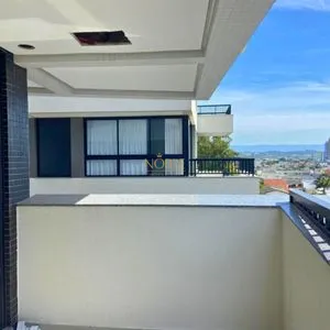 Apartamento com 72m², 2 dormitórios, 1 suíte, 1 vaga no Majestic Residencial em Torres para Comprar