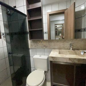 Sobrado com 260m², 4 dormitórios, 1 suíte, 2 vagas no bairro Igra Norte em Torres para Comprar