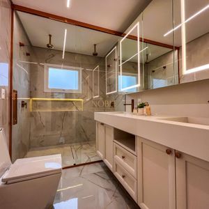 Casa de Condomínio com 432m², 4 dormitórios, 3 suítes, 2 vagas no Reserva das Águas em Torres para Comprar