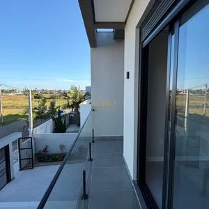 Geminado com 141m², 3 dormitórios, 1 suíte, 2 vagas no bairro Morada das Palmeiras em Torres para Comprar