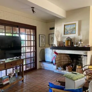 Casa com 247m², 5 dormitórios, 3 suítes, 3 vagas no bairro Praia Grande em Torres para Comprar
